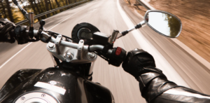 riding motorcycle on road
